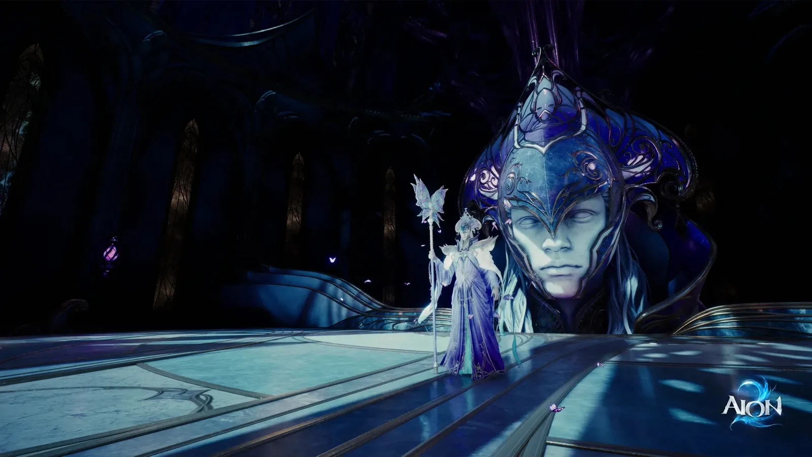 Official AION 2 wallpaper of a robed caster holding a staff before a giant masked statue in a blue hall