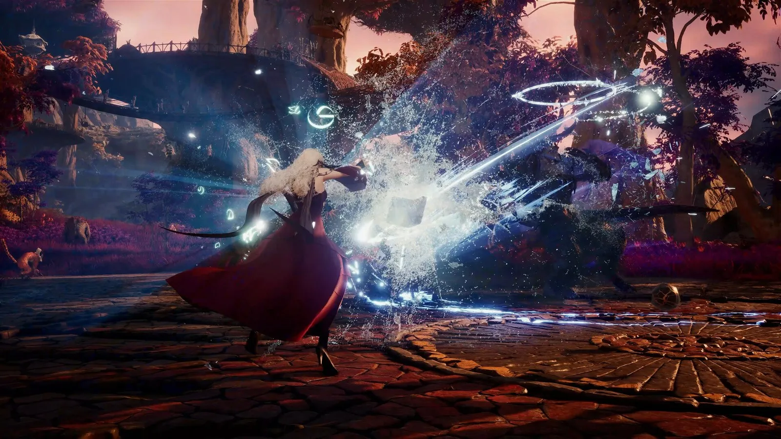Official AION 2 screenshot of a robed caster surrounded by swirling blue magic